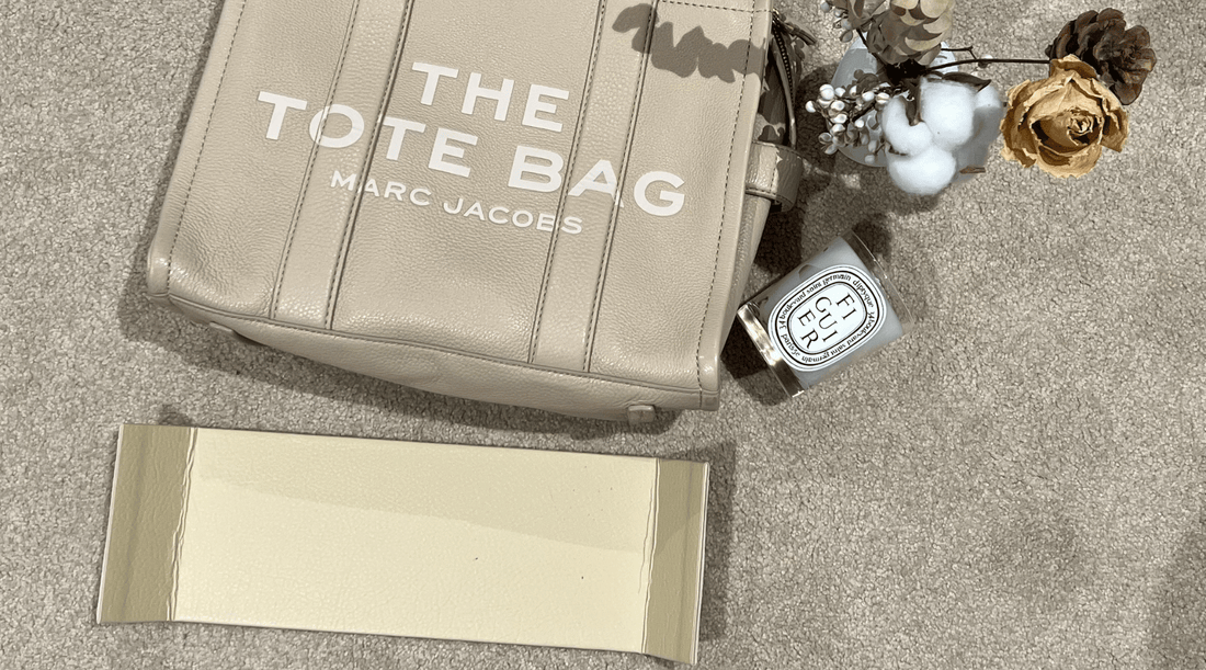 Soft tote bag sagging under the weight of everyday items
