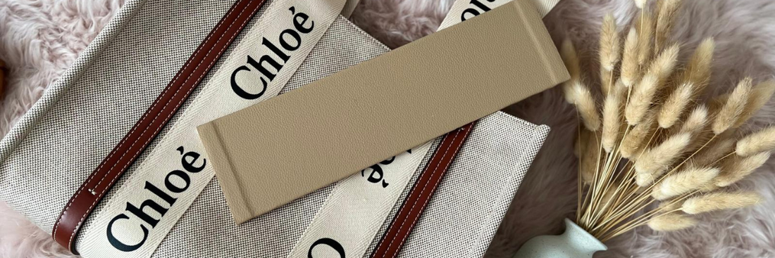 Designer handbag stored upright with gentle internal support to help prevent sagging